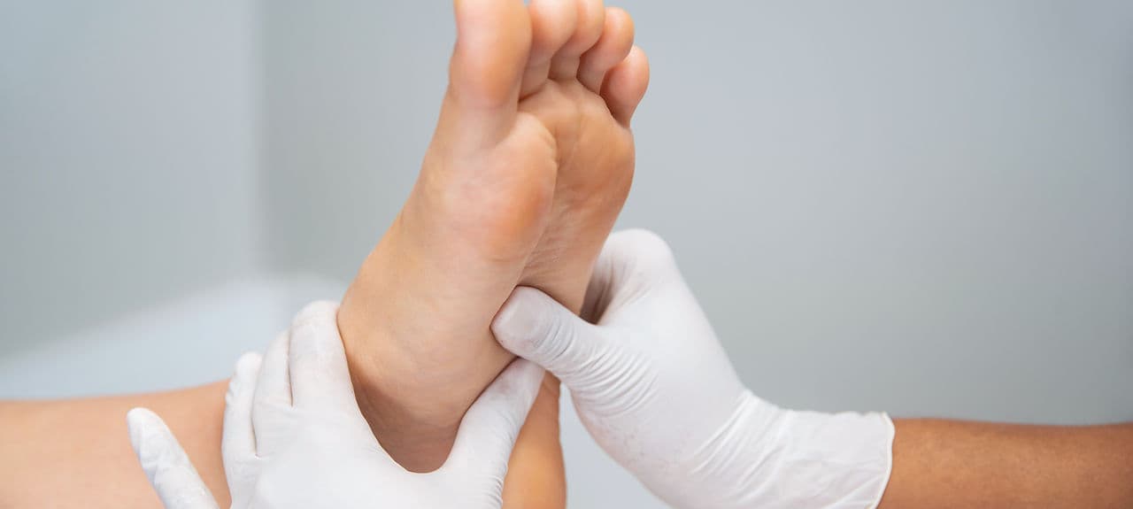 Therapist performing targeted, condition-specific medical massage work.